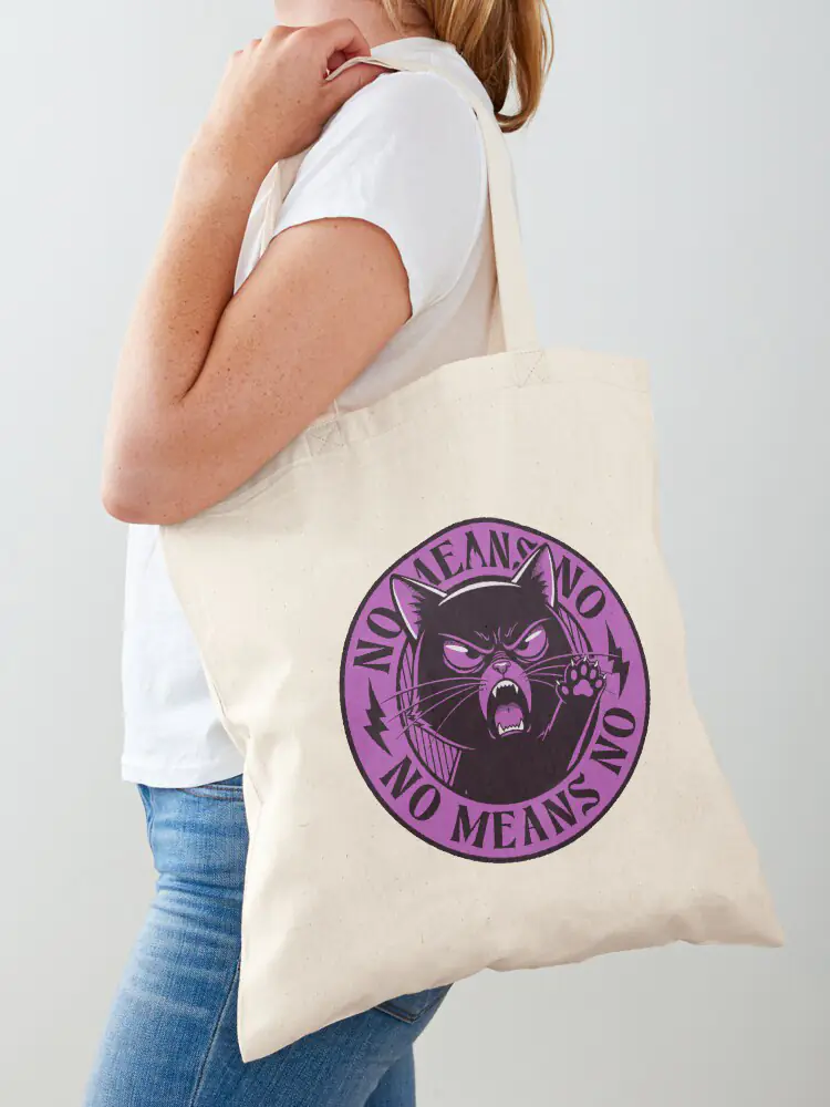White canvas tote bag with a bold "No Means No" activism print, perfect for rallies and everyday use.