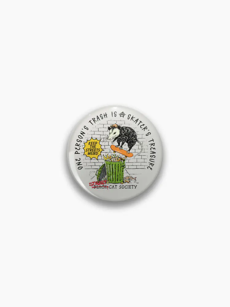A small circular button pin featuring the "One person's trash is a skater's treasure" skateboarding opossum logo for bags and jackets.