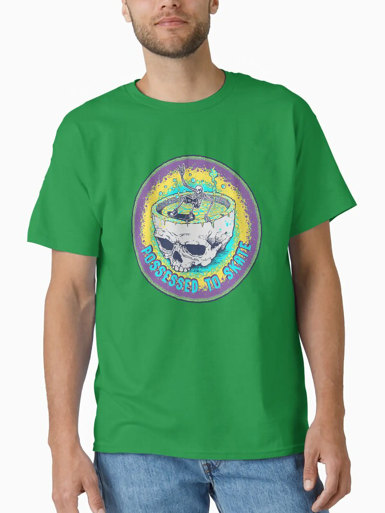Man wearing a bright green t-shirt with a large-scale circular graphic of a skeleton skateboarding inside a skull.