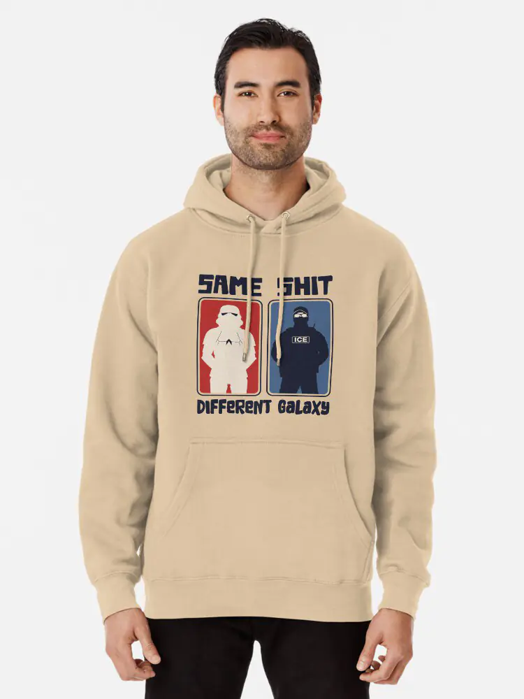 Man wearing a beige pullover hoodie with the "Same Shit Different Galaxy" graphic featuring a Stormtrooper and ICE agent.