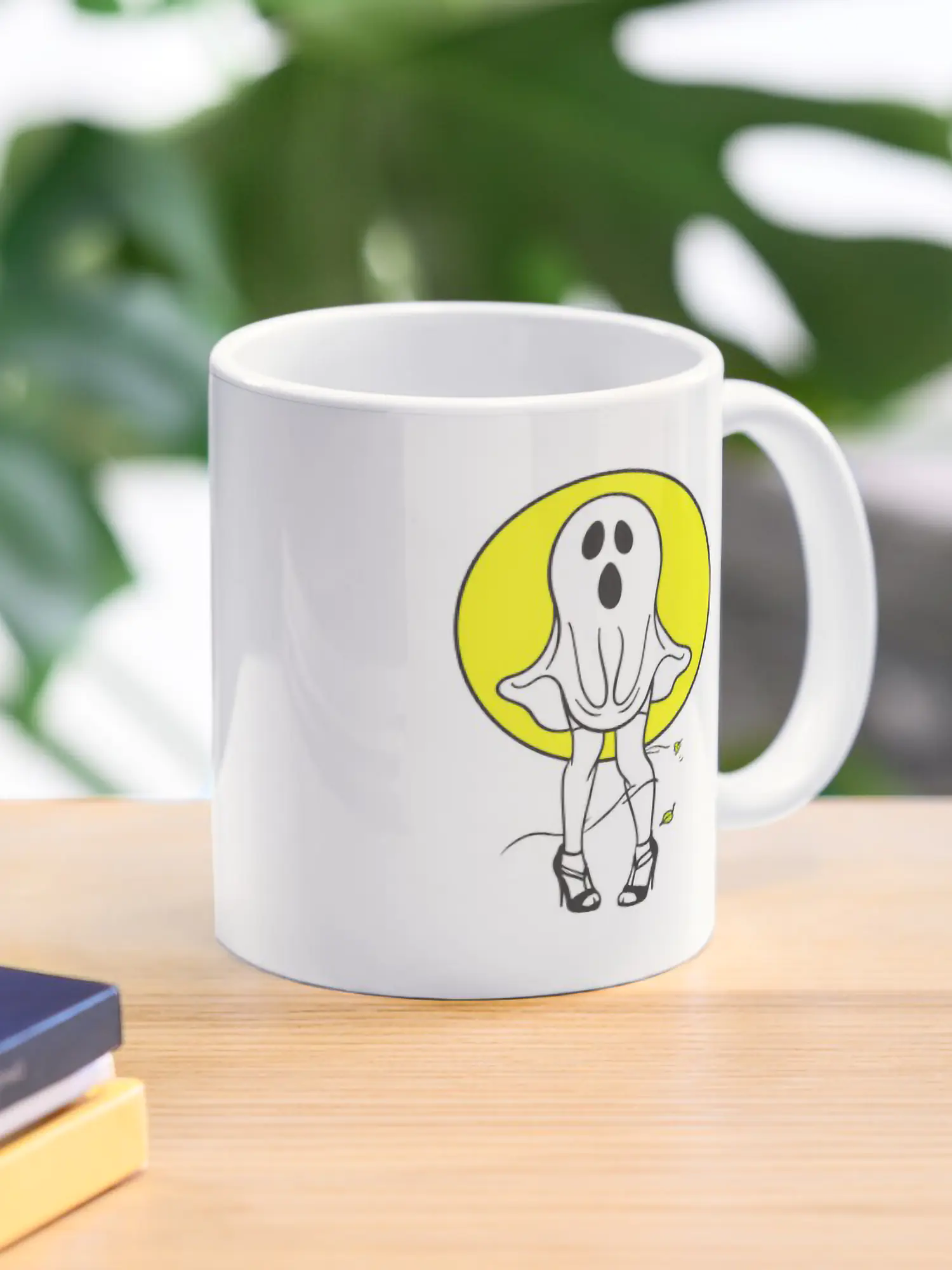 White ceramic coffee mug featuring a ghost-in-heels graphic.