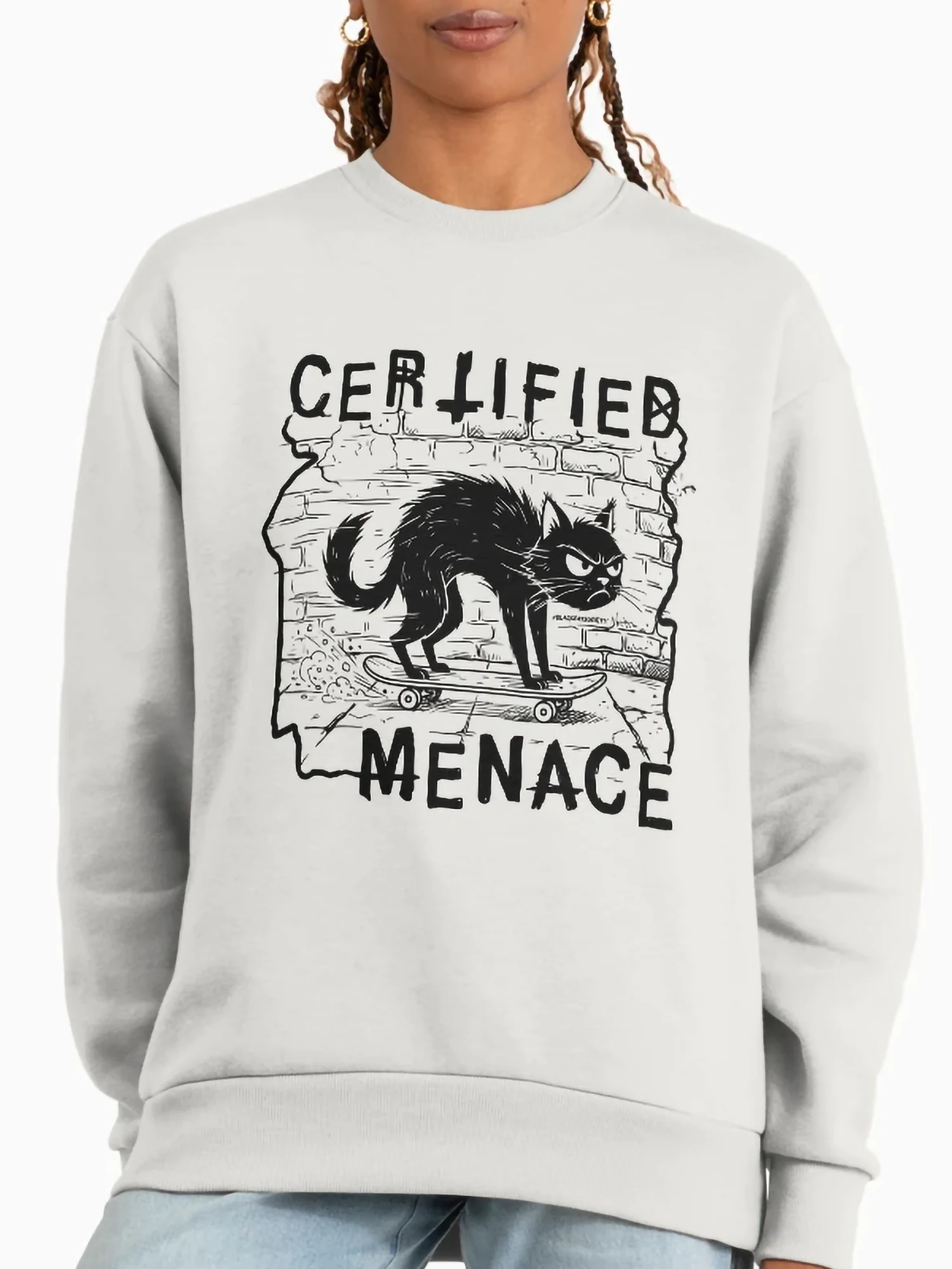 White oversized sweatshirt front print featuring certified menace cat skater cat graphic