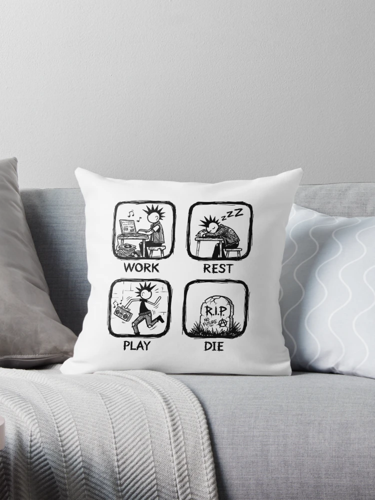 Work rest play die punk art on white throw pillow on grey couch
